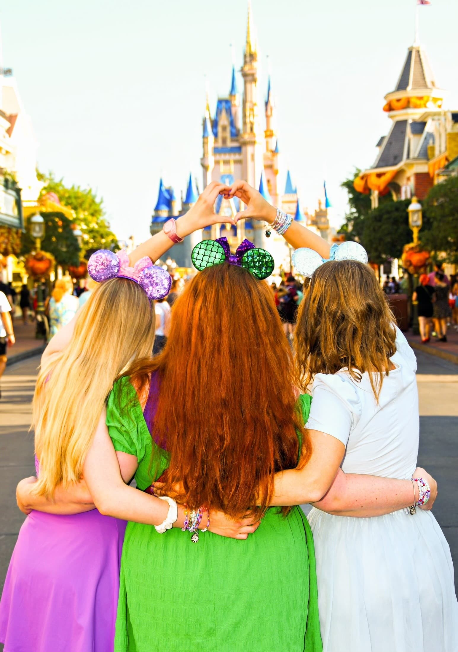 Pure Joy agents together in front of the Disneyworld castle